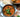Creamy tomato and coconut dhal with cavolo nero